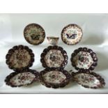 A set of eight early 20th century Copeland plates with painted and gilded Imari type decoration in