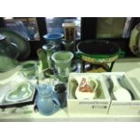 A collection of Wedgwood ceramics including a pair of green ground Jasperware candlesticks, two