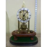 A skeleton clock in brass with silvered chapter ring and with single train fusee movement, J H Allis