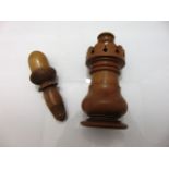 A 19th century treen fruitwood cotton reel tower of castellated form and treen thimble case
