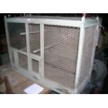 A rustic painted pine framed and chicken wire birdcage, two vintage timber bottle crates, a salt