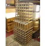 Four small contemporary wine racks, thin slatted steel and pine constructed each to hold 36 bottles