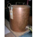 A vintage copper cylindrical urn complete with lid and iron fixed loop handles and pronounced