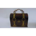 A Victorian burr walnut casket with domed lid overlaid with engraved brass strap work, the