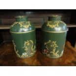 A pair of Victorian style tin tea canisters of cylindrical form with domed tops (complete with