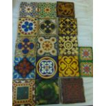 A collection of 19th century ceramic floor tiles, mainly in a gothic taste with polychrome detail,