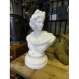 A contemporary cast composite (to simulate marble) head and shoulder bust of a classical