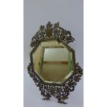 A 19th century silver plated dressing table mirror with octagonal mirror plate, the framework with