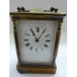 A late 19th century brass carriage clock with 8 day timepiece