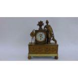 Early 19th century French gilt brass mantle clock, the casework with embossed cherub quiver and swag