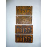 Two pairs of vintage American pressed steel car number plates dated 1941 and 1947
