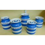 A collection of five T G Green blue and white banded storage jars, of various sizes, all named,