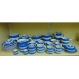 A collection of T G Green Cornishware with blue and white banded detail comprising two large jugs,