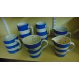 A collection of T G Green blue and white banded ware comprising six jugs of various shapes and