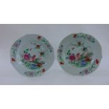 A pair of 19th century Chinese porcelain plates with scalloped borders, peony and Ho-Ho bird detail,