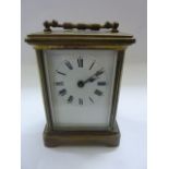 A 19th century brass cased carriage clock with 8 day time piece