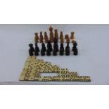 A set of rosewood and boxwood chess pieces (lacks one boxwood pawn), maximum height 12 cm together