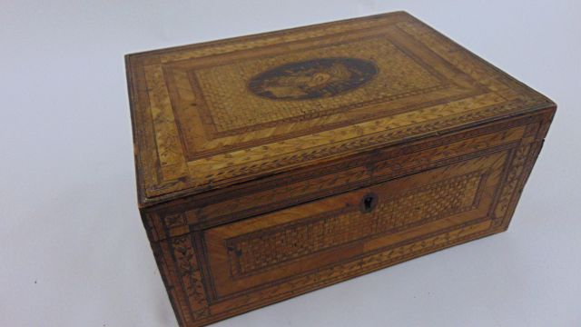 An early 19th century Napoleonic marquetry straw work box, the lid 25 cm maximum