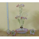 A Victorian epergne with fluted basin, central trumpet flanked by further shorter trumpets,