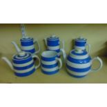 A collection of T G Green blue and white banded tableware comprising two teapots, water jug, two