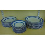 A collection of T G Green Cornish blue and white banded ware plates comprising twelve dinner