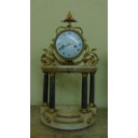 A 19th century French mantle clock in the classical style, the portico base in cream and grey
