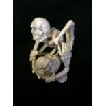 Carved Whale Bone into the Form Of Two Skeletons  10 cm high To bid live please visit www.