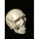 Carved Whale Bone Into the form of a SKULL, measures 5 cm high To bid live please visit www.
