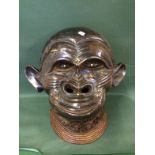 Very Unusual And Rare Terracotta Gorilla Head dress,  35cm high To bid live please visit www.