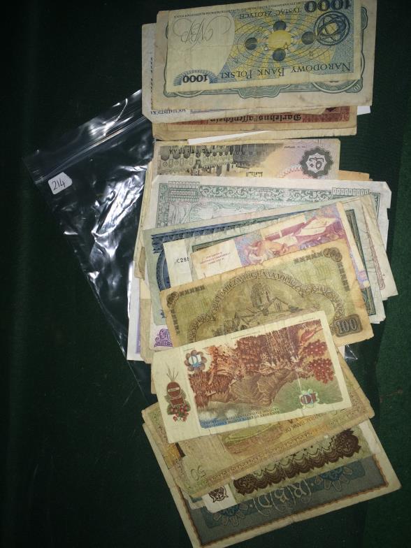 60+ World Banknotes, Dating from 1910 onward, Poor to Very Fine To bid live please visit www.