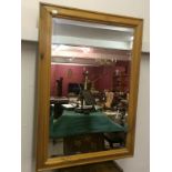 A Pine Bevelled Edge Mirror  88Cms X 63Cms To bid live please visit www.yeovilauctionrooms.com