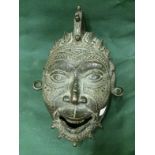 Bronze Tribal Mask From Tikar, measures 36cm x 26cm To bid live please visit www.