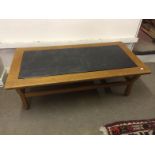 Vintage Coffee Table Having A Heavy And Unusual Slate Insert To bid live please visit www.
