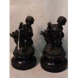 Pair Of 19thc Spelter Cherub Figures On Turned bases To bid live please visit www.