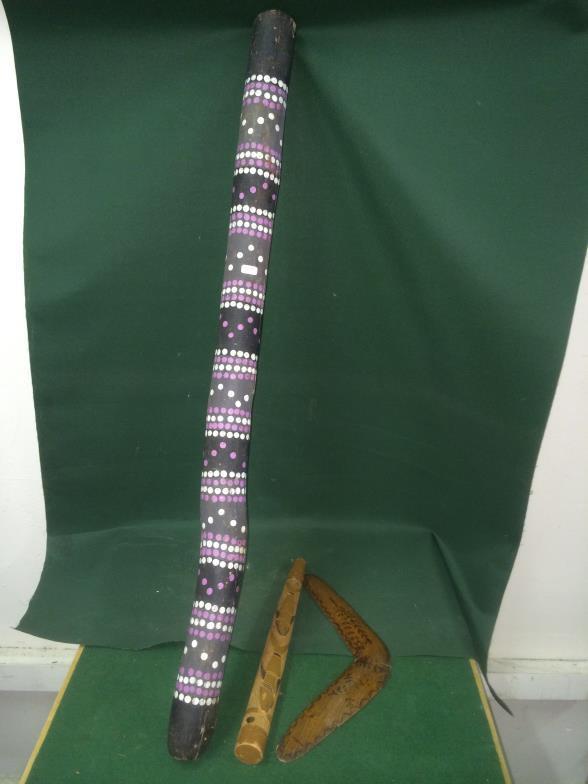 A Didgeridoo, Boomerang and Tribal Pipe x3 To bid live please visit www.yeovilauctionrooms.com