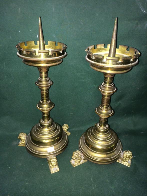 A Pair of Empire Style Lion Feet Candle Sticks, Measures 31cm High To bid live please visit www.