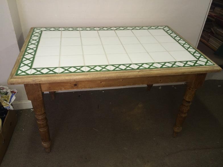 Pine Table With Tiled Top 130cms Wide x 77 High x 84 Deep. To bid live please visit www.