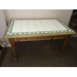 Pine Table With Tiled Top 130cms Wide x 77 High x 84 Deep. To bid live please visit www.