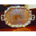 VICTORIAN SILVER PLATED HEAVY SHAPED TWO HANDLED OVAL TRAY WITH CHASED FLORAL AND ROCCOCO DECORATION