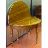 FRENCH DEMI-LUNE WALNUT TEA TABLE WITH A FOLDING TOP AND A DRAWER, ON TURNED TAPERING LEGS (d: 120