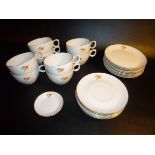 HUGUENOT ROYALE EIGHT CUPS, SEVEN SAUCERS, EIGHT PLATES AND A SMALL DISH WITH SOUTH AFRICAN