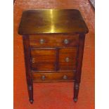 VICTORIAN WALNUT BEDSIDE TABLE WITH A HINGED TOP, DOOR AND TWO DRAWERS, ON TAPERING OCTAGONAL