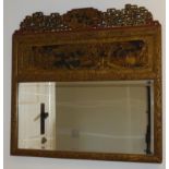 ORIENTAL WALL MIRROR WITH A BEVELLED RECTANGULAR PLATE IN A CARVED FIGURE AND FLORAL DECORATED FRAME