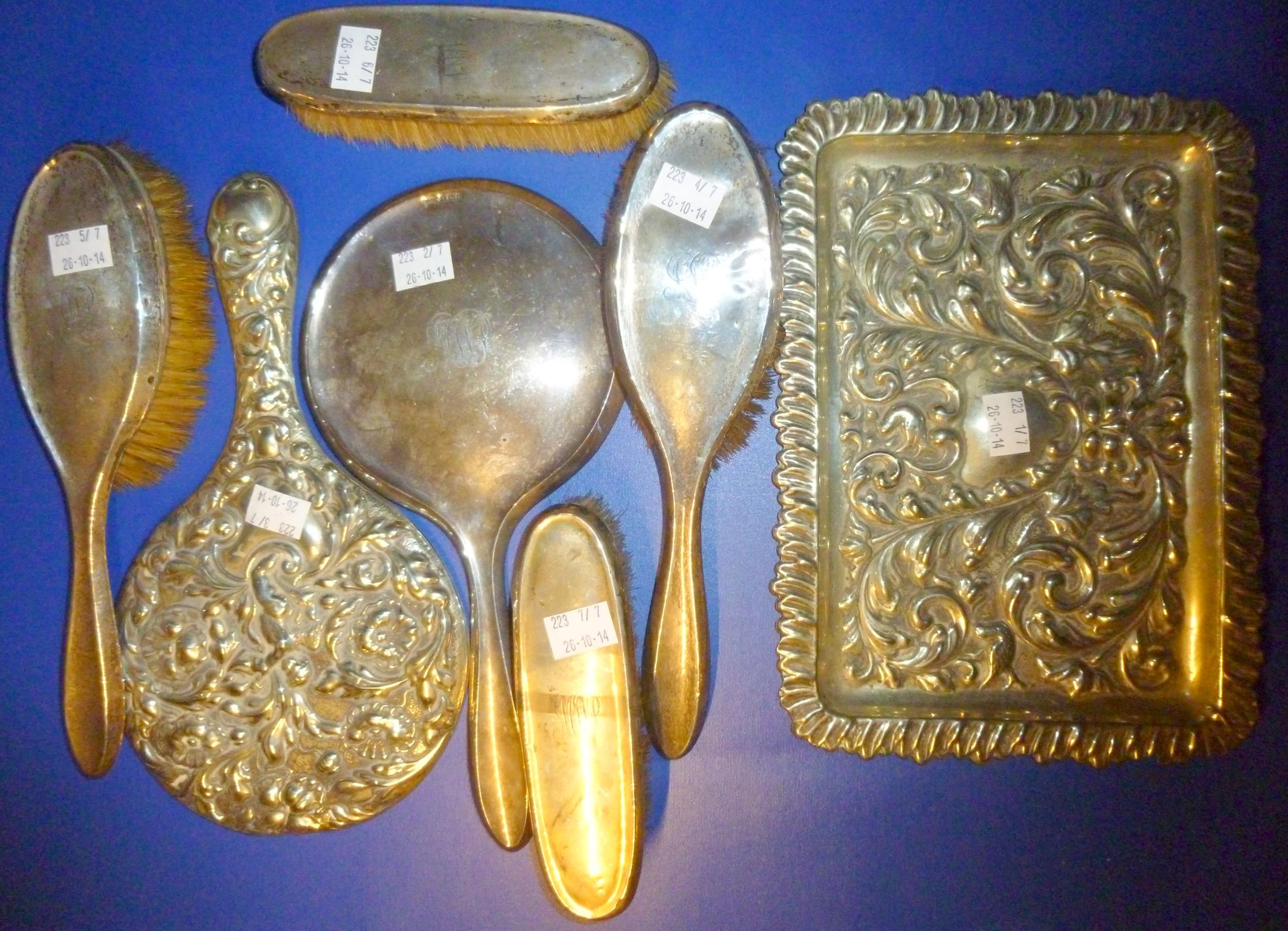 FOUR SILVER BRUSHES AND A HAND MIRROR TOGETHER WITH TWO OTHER ITEMS