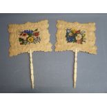 A PAIR OF VICTORIAN PAPER MACHÉ FANS OF A PRESSED SCROLL AND FOLIATE DESIGN IN RELIEF, SURROUNDING A