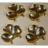 AN UNUSUAL SET OF FOUR EDWARDIAN SILVER CLIP-ON SHAMROCK CONDIMENT DISHES BY H HAYES, BIRMINGHAM