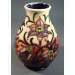 MOORCROFT PASQUE FLOWER PATTERN VASE DESIGN BY PHILIP GIBSON, DATED 2000 (H: 13.5 cm)