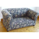 A GEORGE V CHESTERFIELD WITH DROP END (FAULTY) UPHOLSTERED IN FLORAL FABRIC (W: 158 cm)