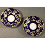 PAIR OF SPODE PORCELAIN CABINET SAUCERS PAINTED WITH DARK BLUE AND GILT FLORAL DECORATION, CIRCA