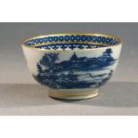 A SALOPIAN PORCELAIN TEA BOWL PAINTED WITH BLUE AND WHITE CHINOISERIE DECORATION, CIRCA 1780 (DIA: 9